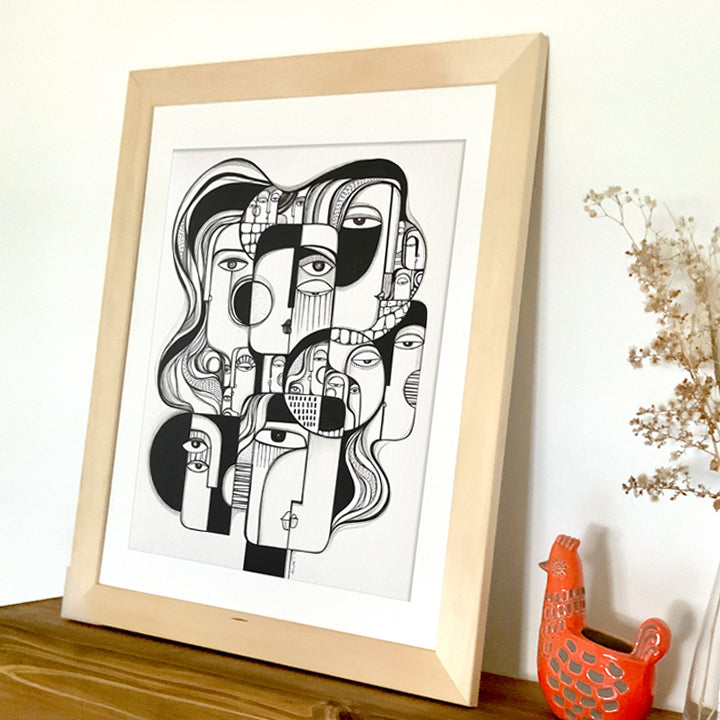 Framed original art titled "In Togetherness" by SoulCurryArt featuring vibrant, abstract brushstrokes in a modern display.