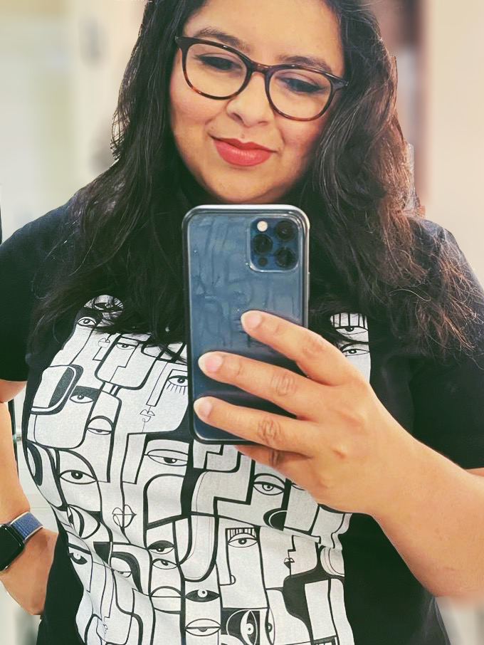 Black Noir T-shirt by SoulCurryArt featuring a simple, stylish design, worn by a person with casual clothing against a plain background.